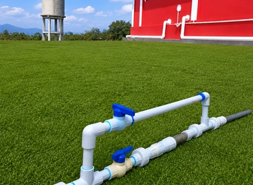Application of Pressure-Independent Flow Regulators in Municipal Water Distribution Networks